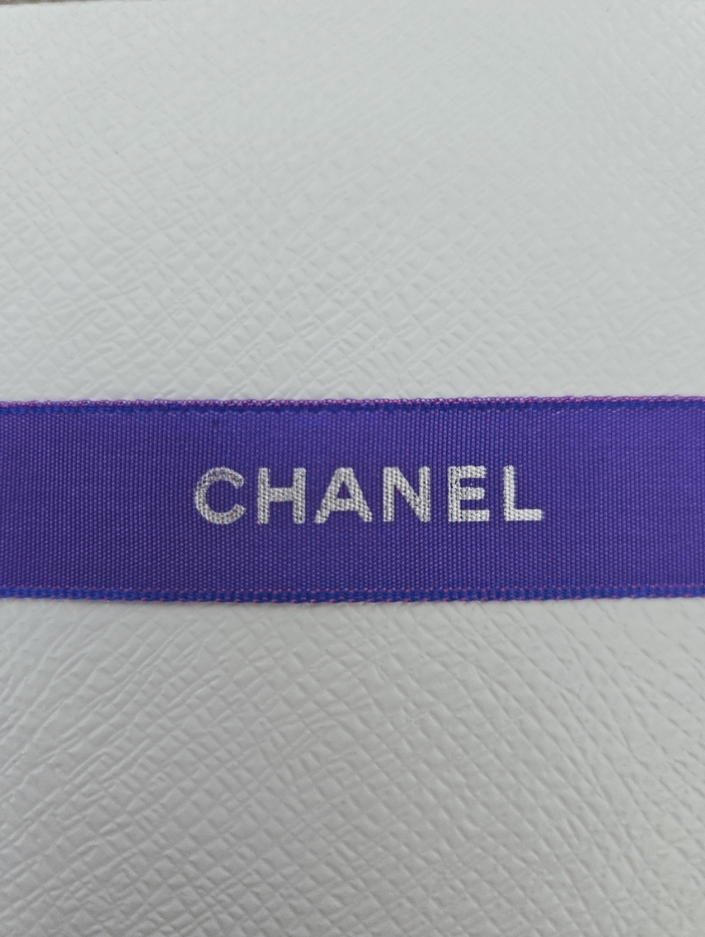 CHANEL Violet Ribbon with Silver Logo